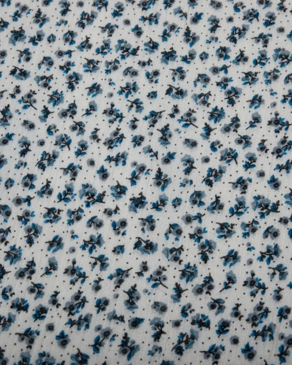 White & Blue Ditsy Floral Printed Rayon Crepe Fabric | 199₹/M